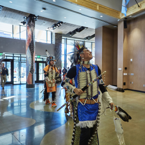 Native American dancers in the entrance of American Indian Hall