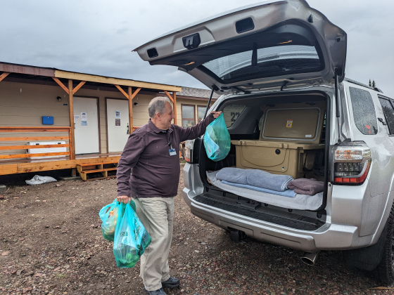 A man loads groceries into the trunk of a car.  | Submitted photo