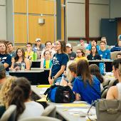 Students listening to a presenter