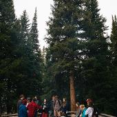 People standing around a campfire