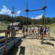 Students receiving a safety briefing for climbing course