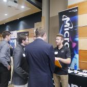 Engaged conversation between potential employer and students