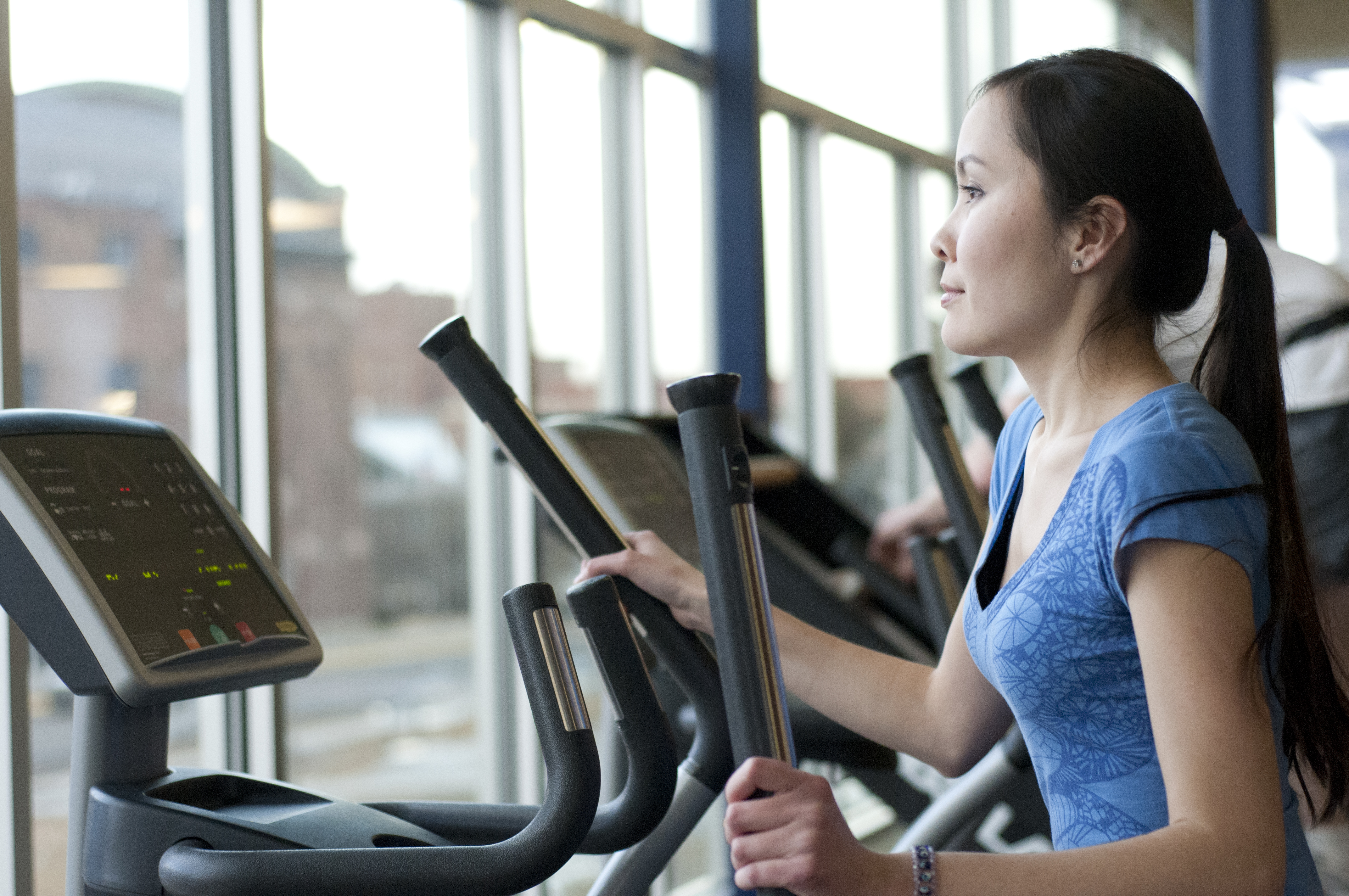 A picture of a woman using the Fitness Center