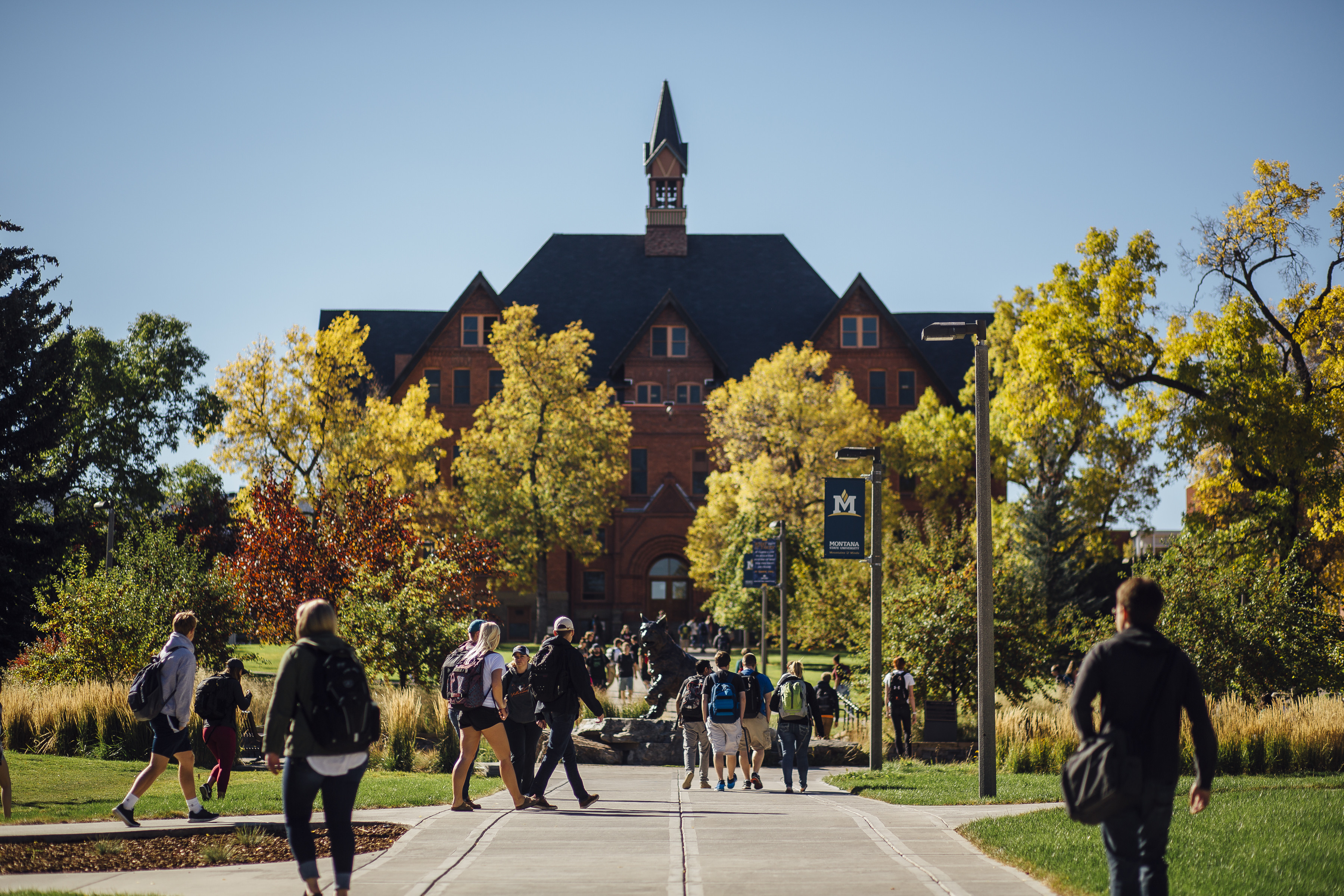 students with MT hall in background