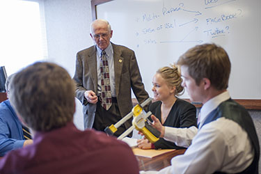 Professor Gary Bishop working with students in his pro bono consulting course