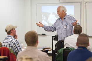 Jake Jabs talking to students in a classroom.