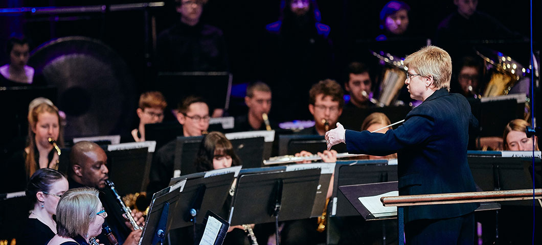 MSU symphony performs with the band, Kansas on stage.