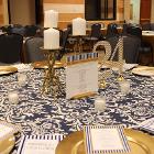 Image of table decorations on round table with number 24.