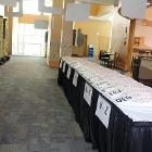 Image of entrance table with numbers for patrons.