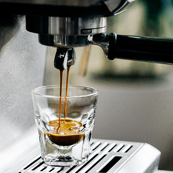 picture of an espresso machine making espresso