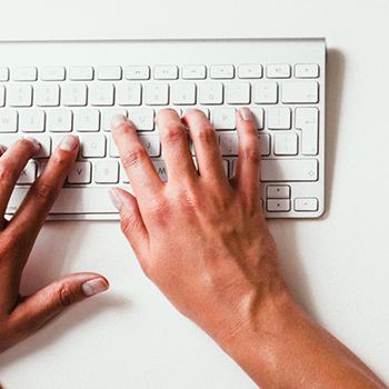 Fingers on a keyboard