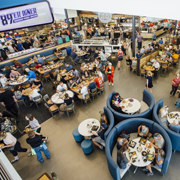 interior picture of rendezvous dining pavilion with hundreds of people sitting at tables eating