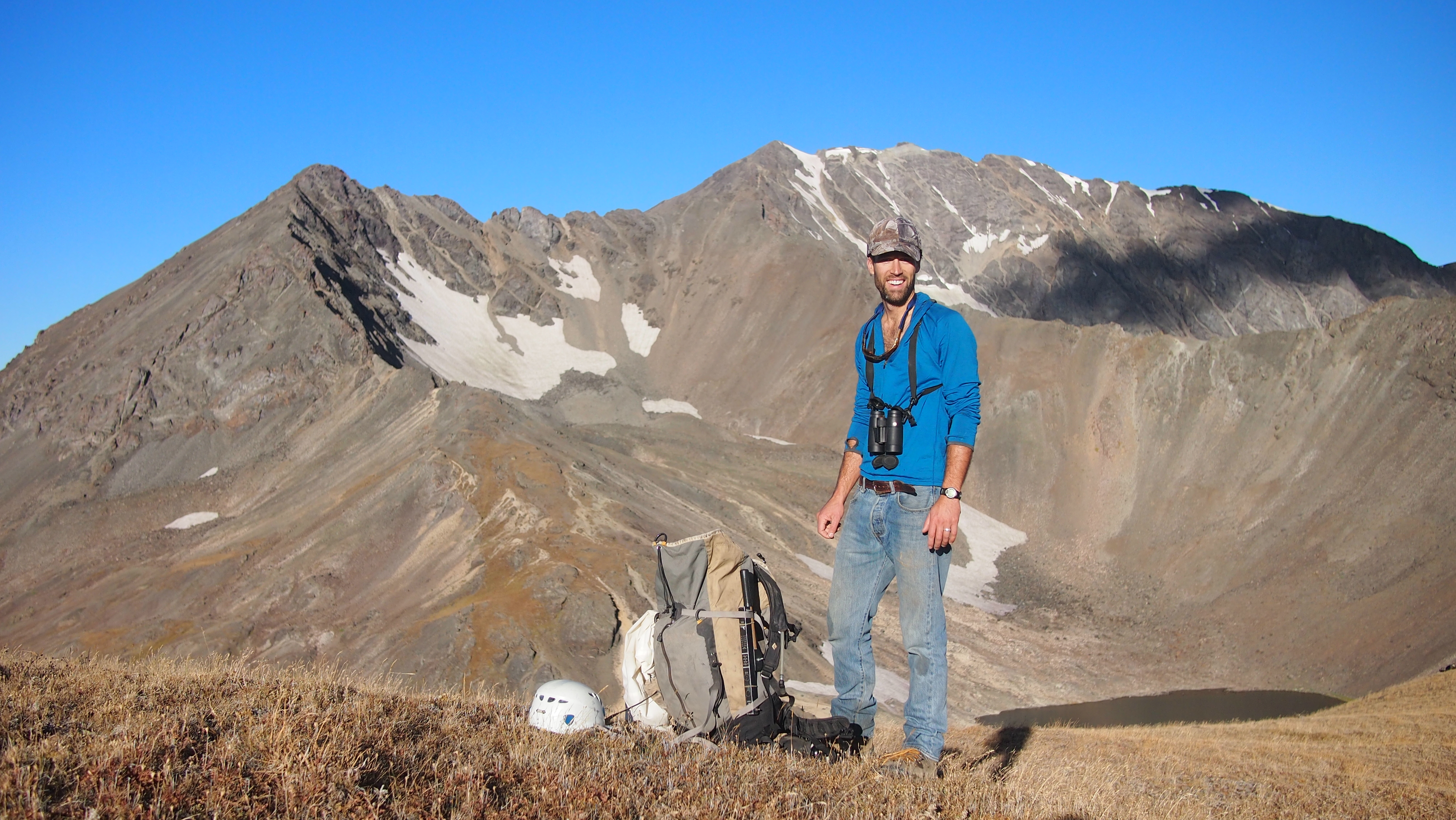 Blake on top of a mountain
