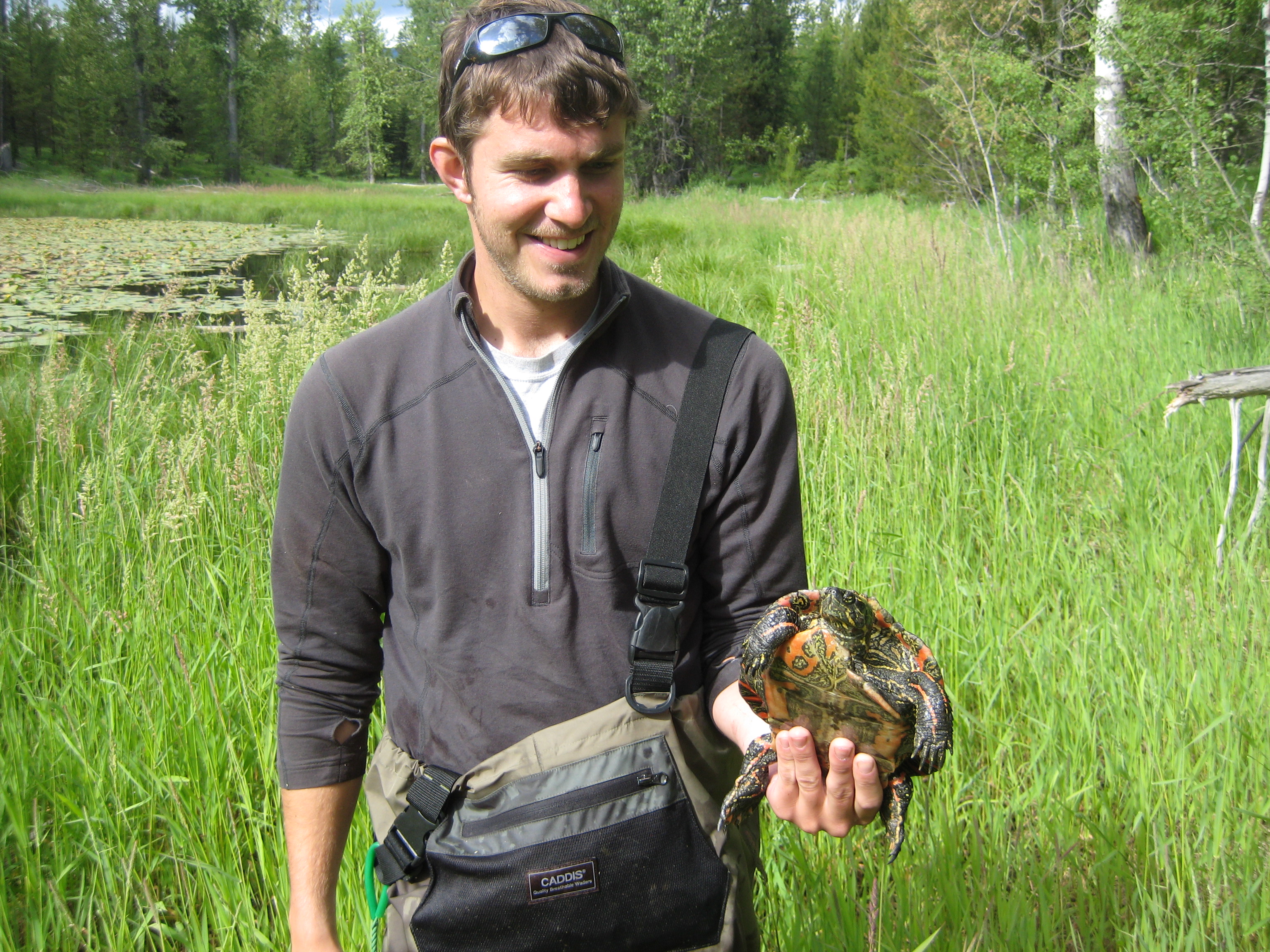 Mike holding a turtle