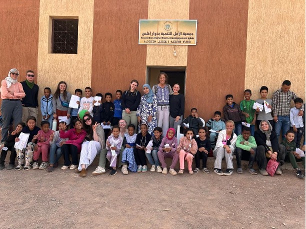 Wendy Morical, Sue Stolp, and EHHD Students with Ighls Village students