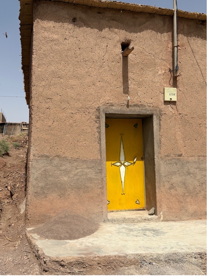 Yellow Door in Ighls, Morocco