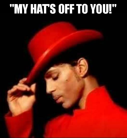 Prince tipping his hat.