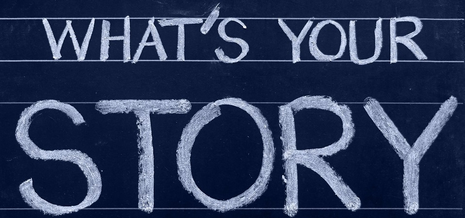 chalk board that says "what's your story?"