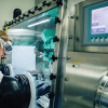 Graduate student Emily Reeves working with air-sensitive compounds in an inert atmosphere glovebox (Photo A. Gonzalez). 