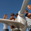 Engineering students and faculty working on wind turbine. MSU photo by Kelly Gorham.