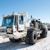 Vibroseis trucks lined up during seismic survey used to investigate subsurface around project site in north central Montana