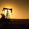 Pumpjack at sunset in northern Montana 