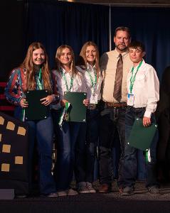 team getting award from adult 