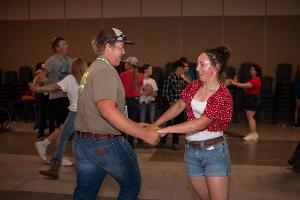 boy and girl swing dancing