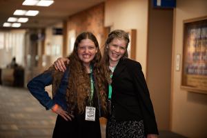 two girls smiling 