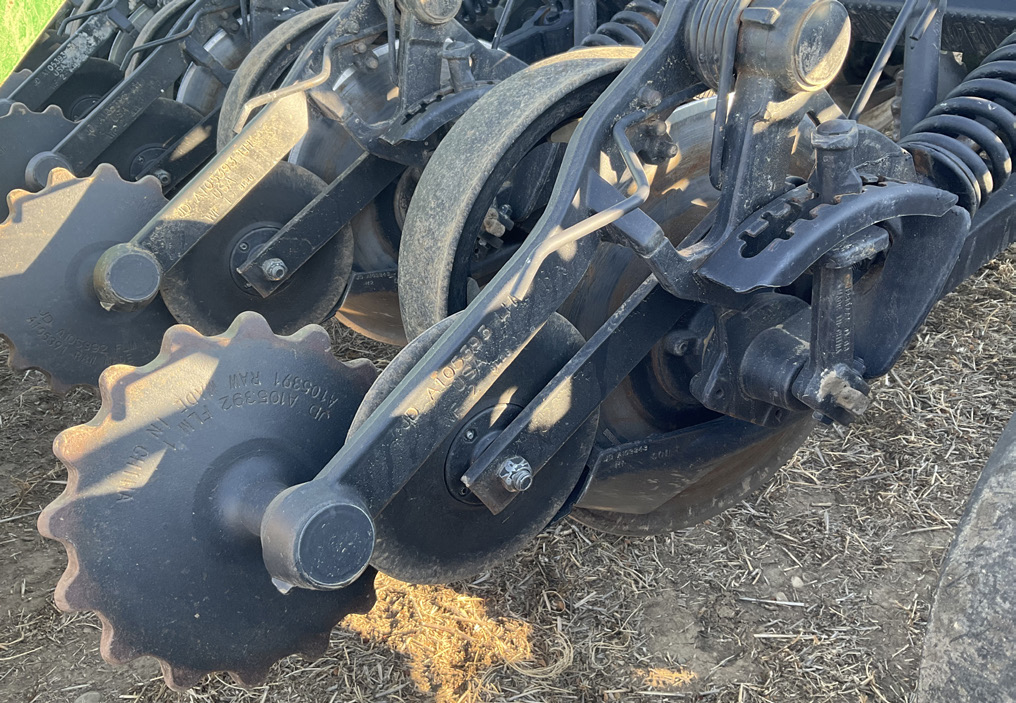 Single-disc drill for seeding into high residue no-till managed fields.