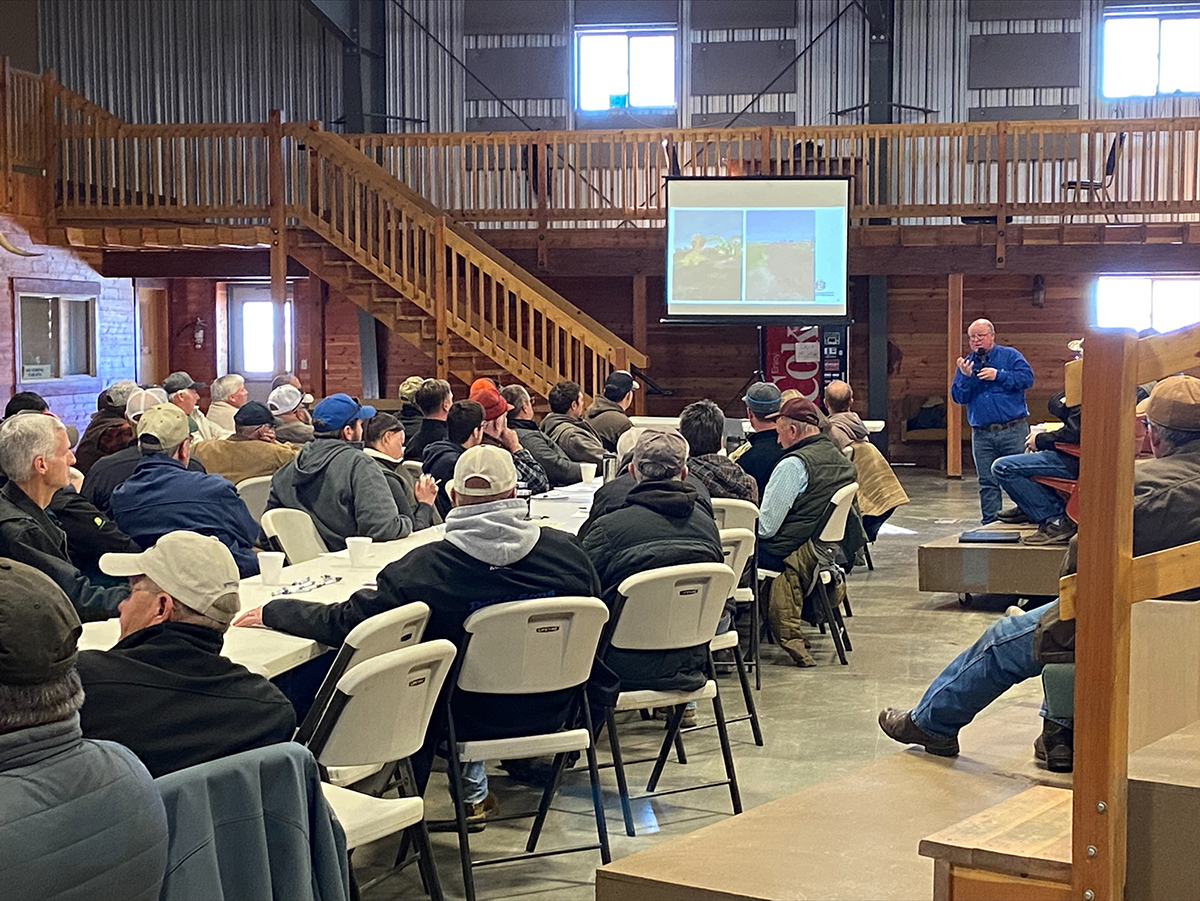Anthony Bly speaks to a large crowd on soil health at the 2023 Crop School.
