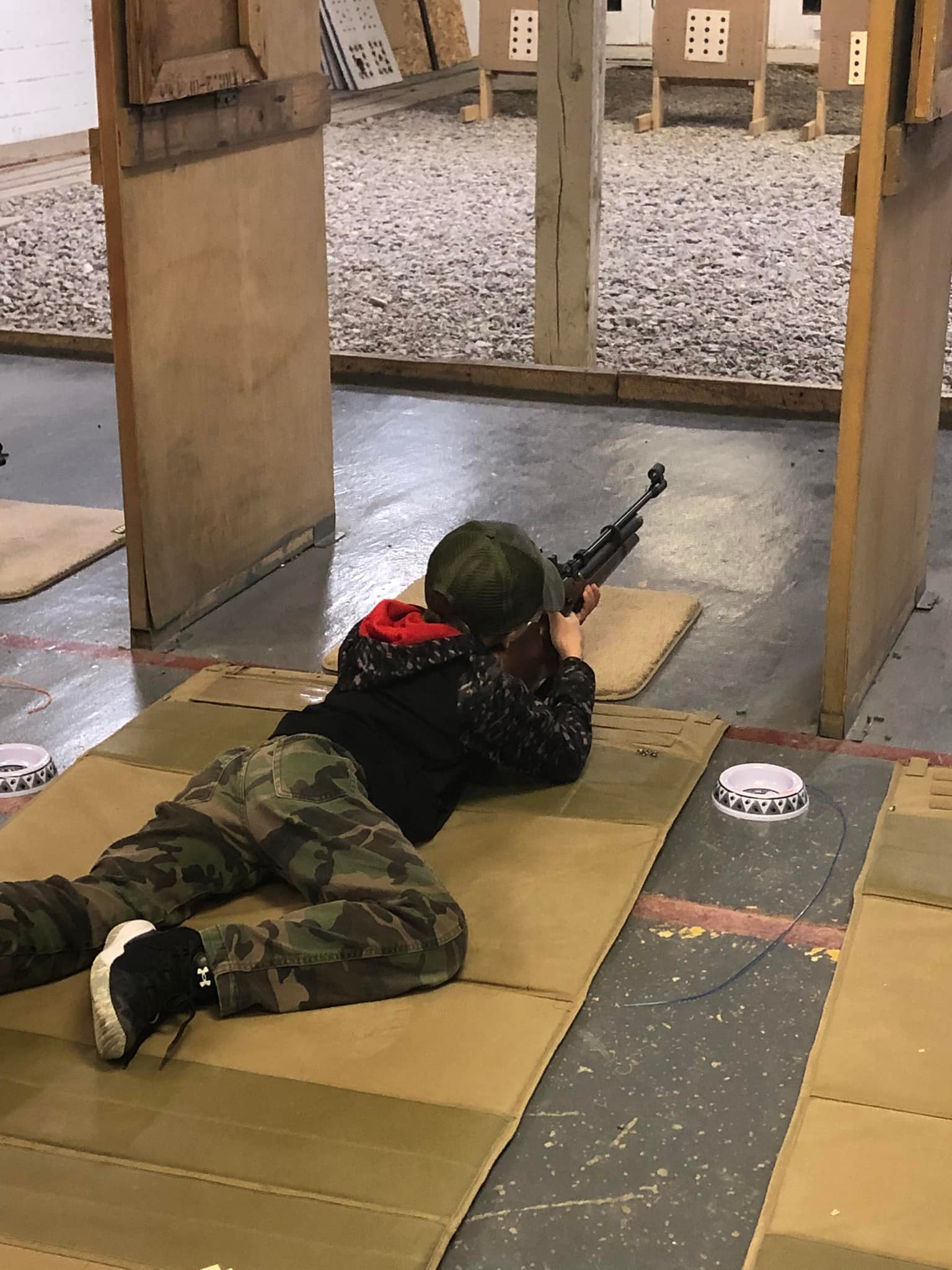 Cascade County 4-H Youth shooting in a prone position