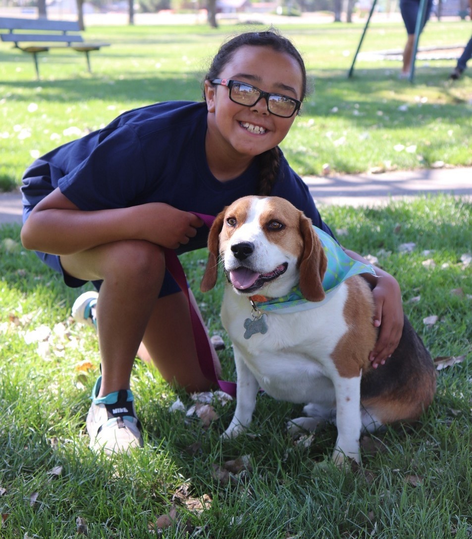4-H members love their animals! Kaylan Reaves and her two-year-old beagle “Jefferson” competed in the dog project at the Powder River County Fair.