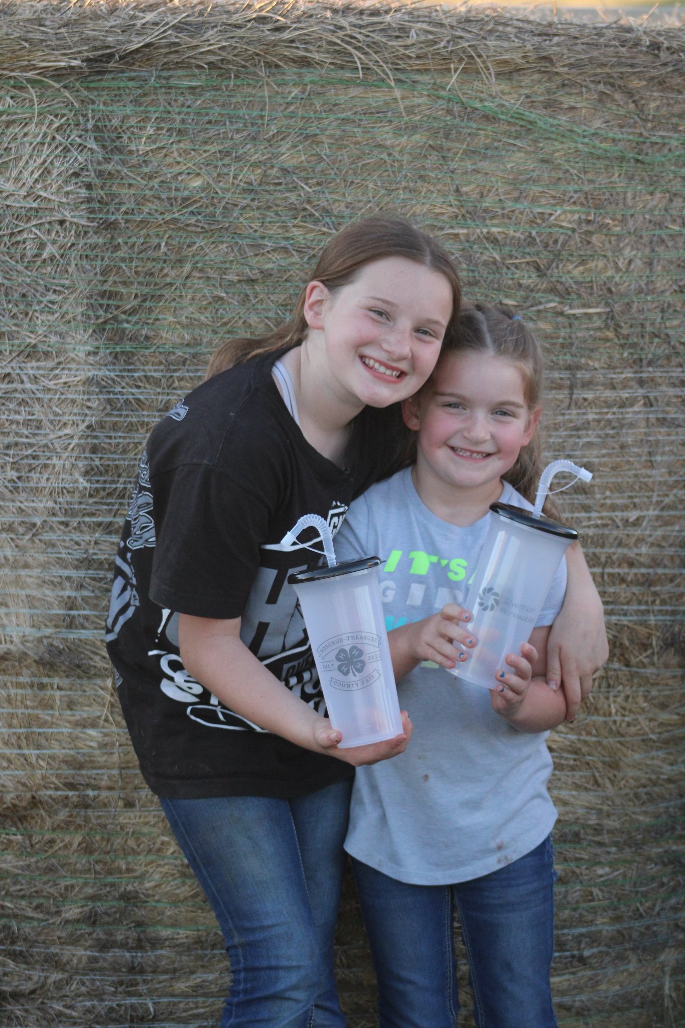 4-H'ers Showing off the annual fair cup
