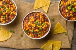 Three bowls of 3-can chili and tortilla chips.