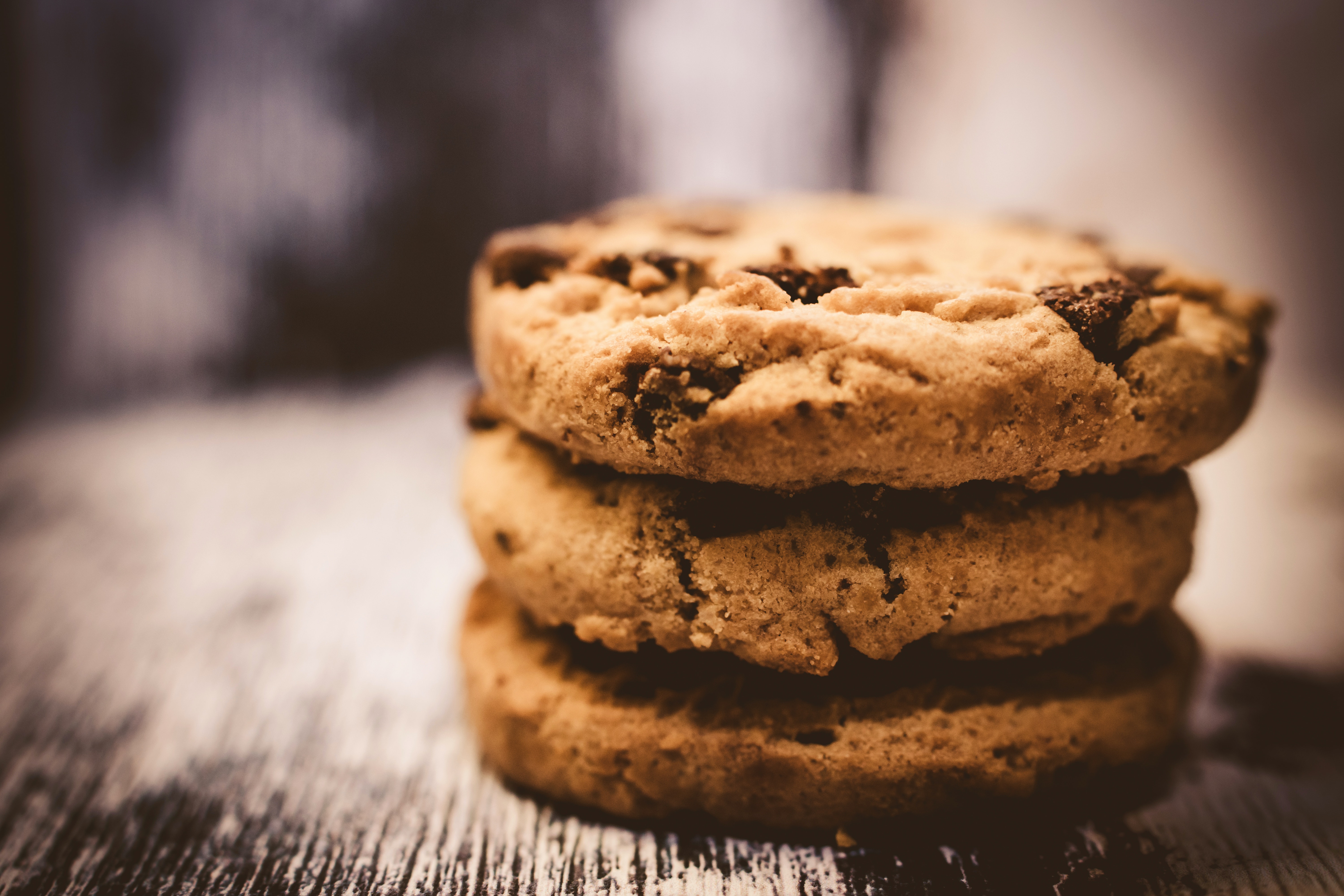 stack of three chocolate chip cookies