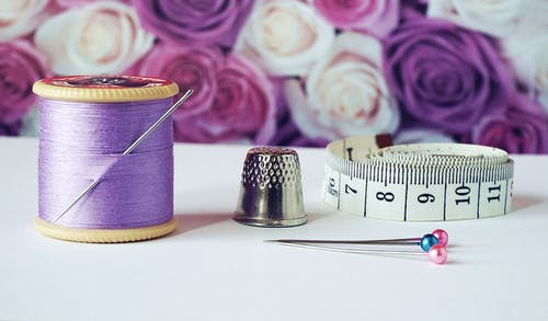 Sewing Thread, Thimble, and Measuring Tape