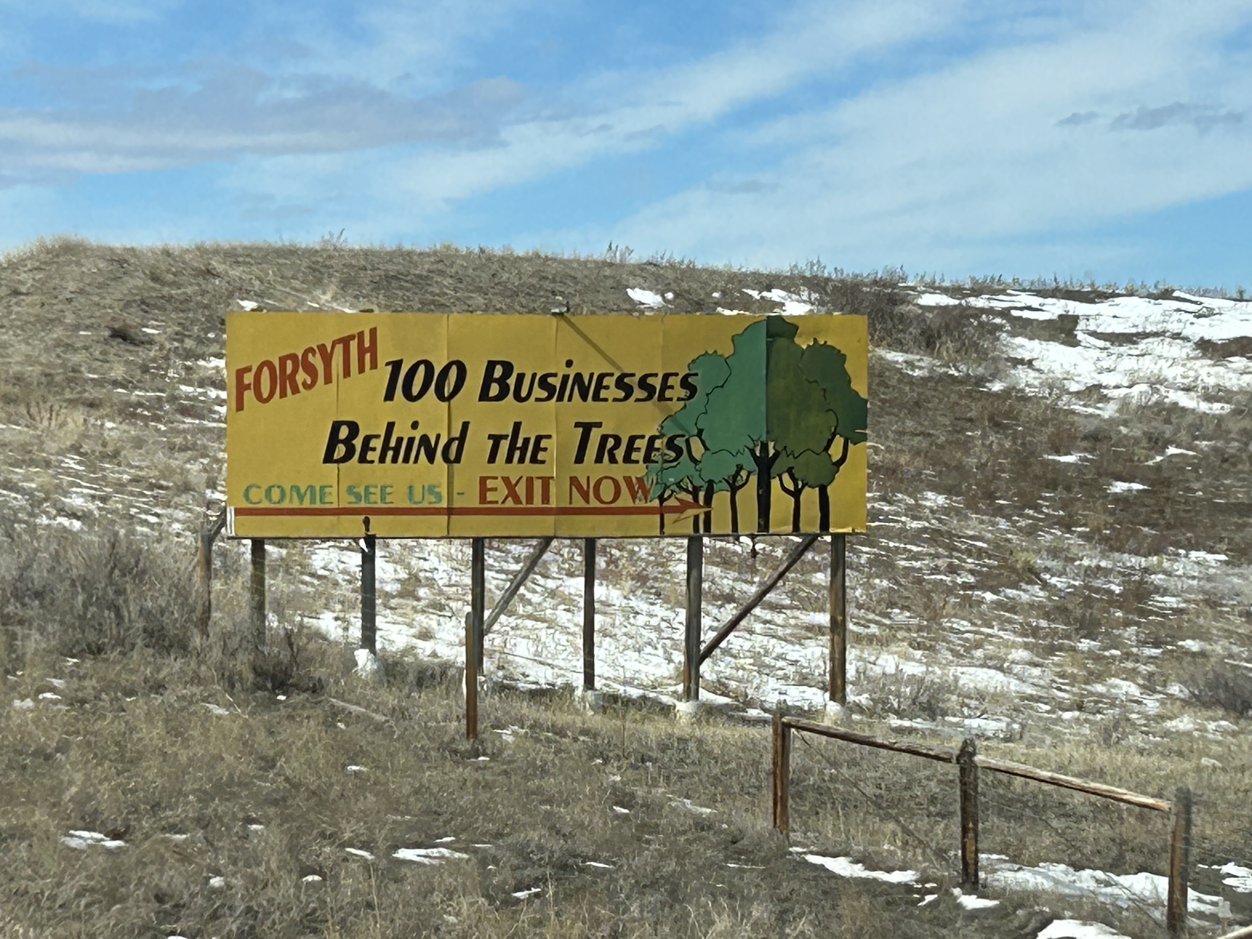 An old billboard in Forsyth, MT.