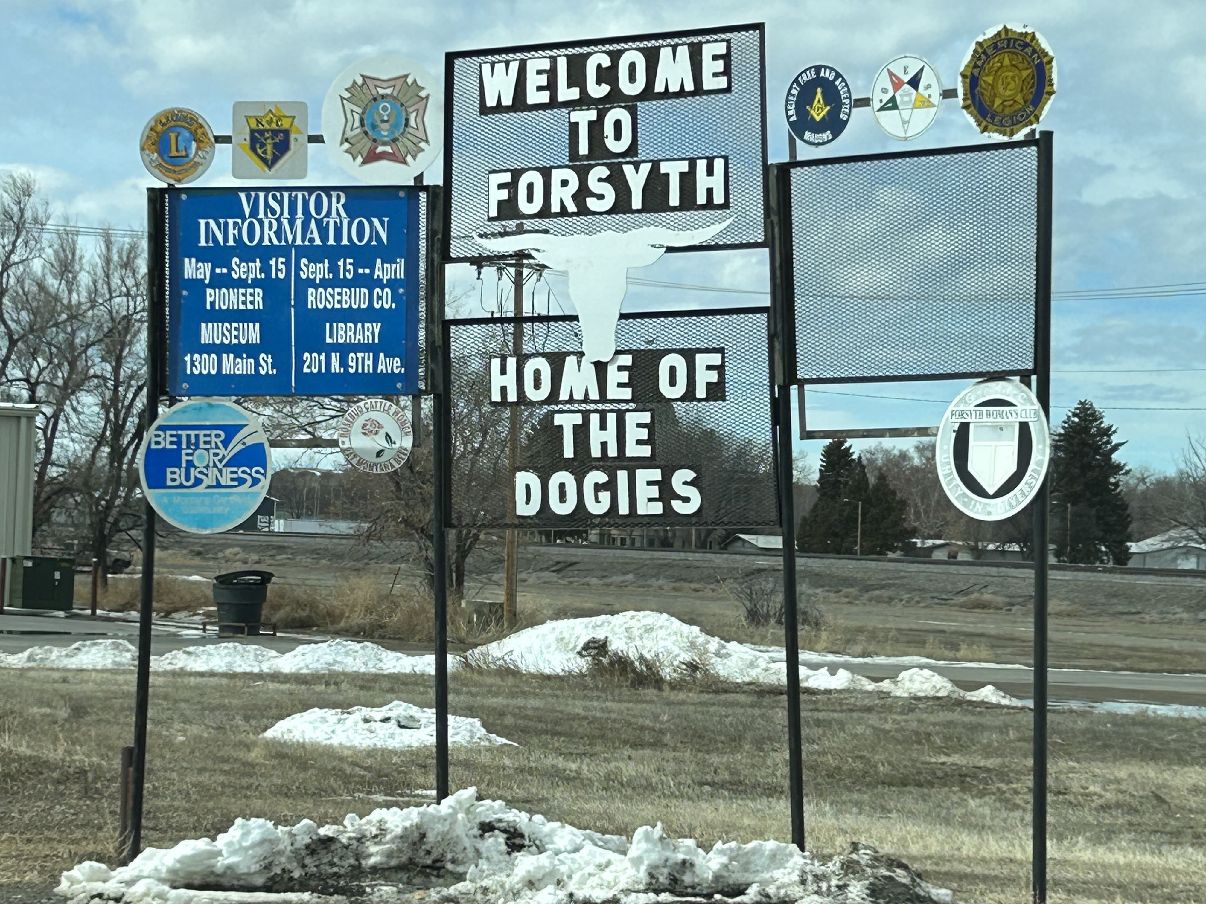 Old welcomes sign in Forsyth, MT.