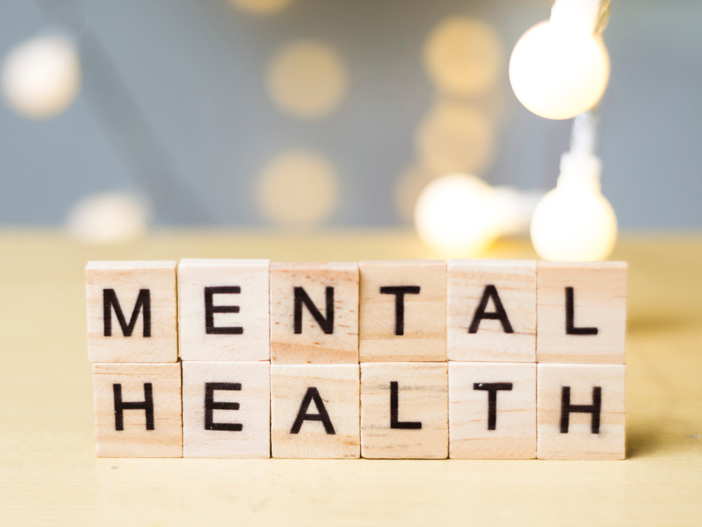 Wood blocks spell out the words Mental Health