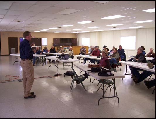 Decorative photo of an IPM specialist in front of a class.