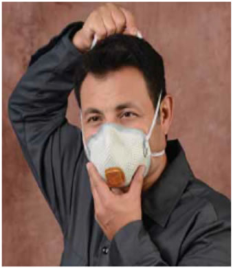 photo, man with respirator over his mouth