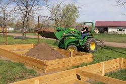 Lyman Asmden with tractor