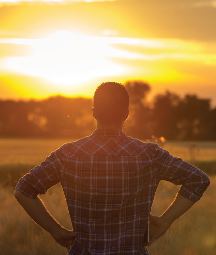 man looking at sun