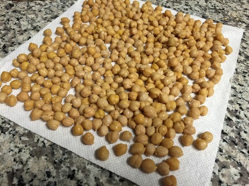 Chickpeas drying on paper towel