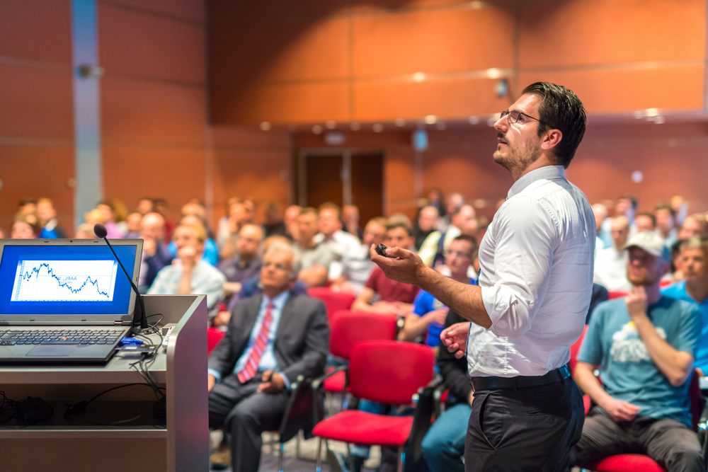 Teaching presenting a lecture to students. 