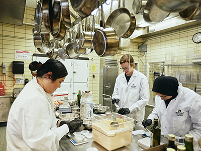students making lentil crackers in Hannon Kitchen