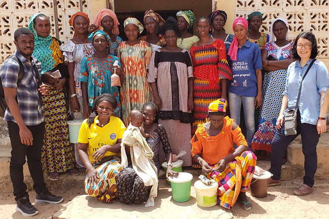 group photo of Edwin Allan and Dr. Kuo with Senegalese farmers