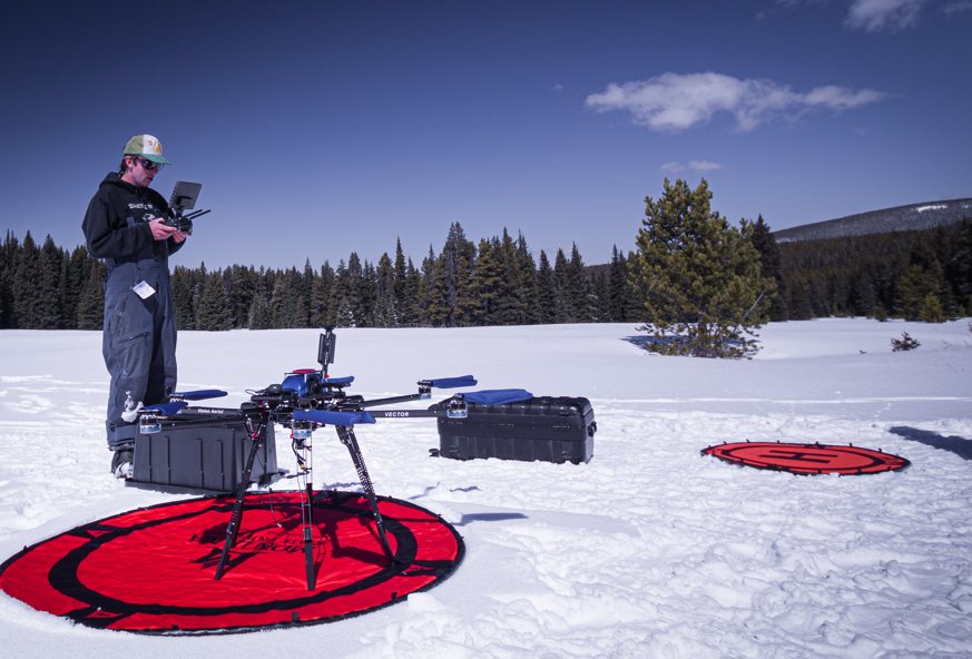 A GCF member setting up a drone to conduct fieldwork