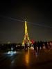 The Eiffel Tower lit up after the students descended.